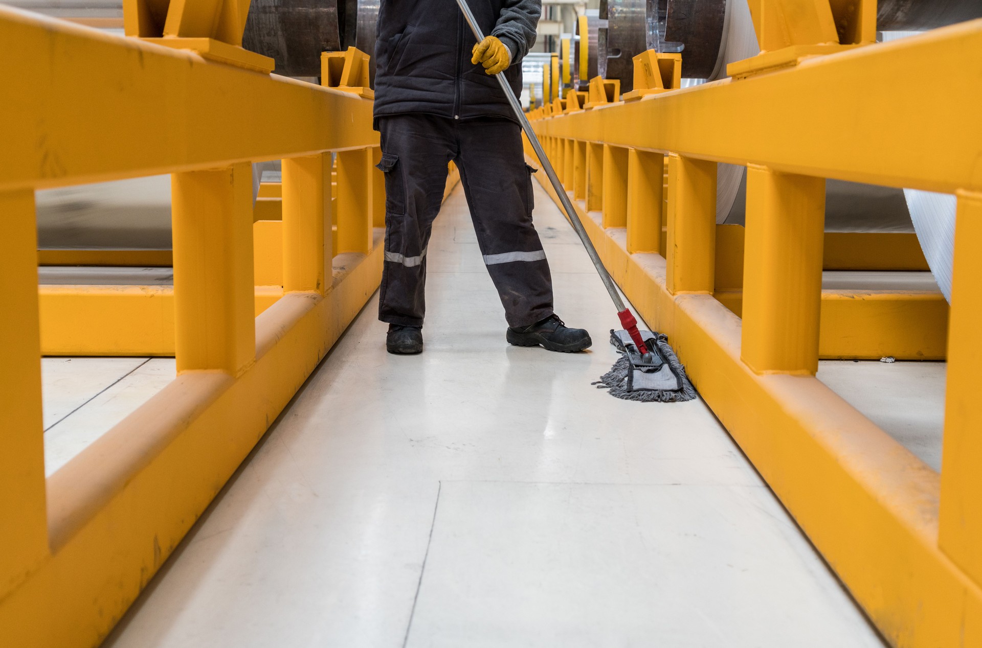 Worker cleaning floor